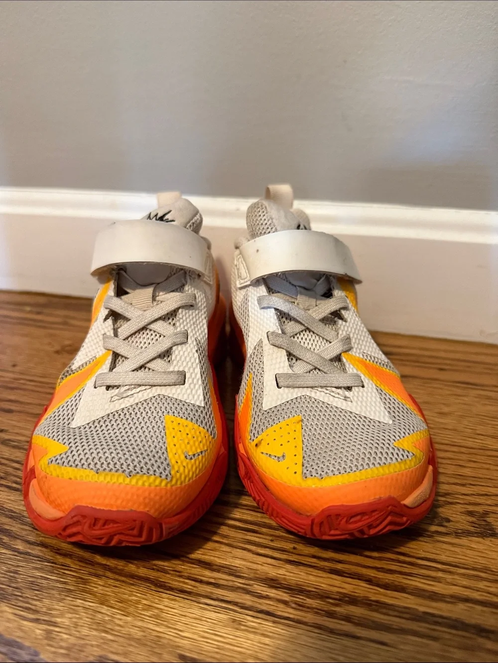 Nike Kids' Gray Sneakers with Orange and Red Lightning Accents